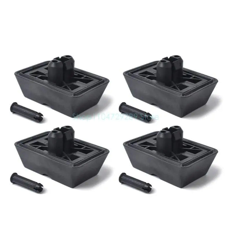 Four black BMW E46 jack pad cushions. Plastic squares provide lifting support for safe and even weight distribution.
