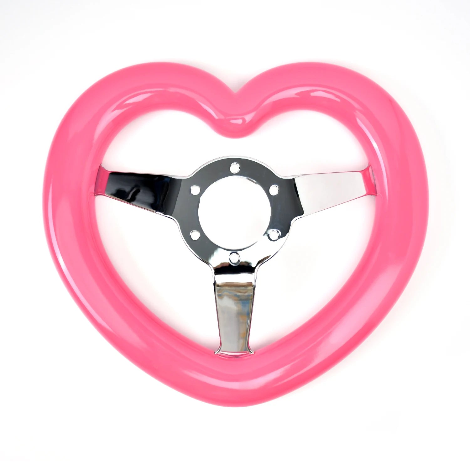 Pink heart-shaped deep dish steering wheel with scissors for comparison size (320mm diameter).