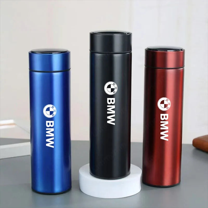 "BMW M Thermos Bottle: 500ML stainless steel travel cup in three colors. Vacuum insulated for temperature control."
