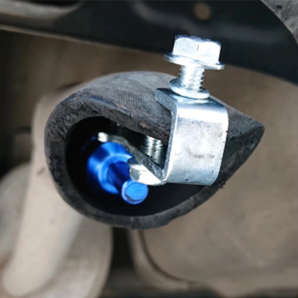 Blue hose connecting to car exhaust pipe (Universal Turbo Whistle Muffler Insert)