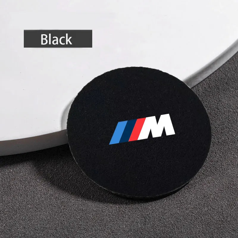 "BMW logo adhesive car decal or sticker" or "Adhesive BMW logo decal for automobile use."