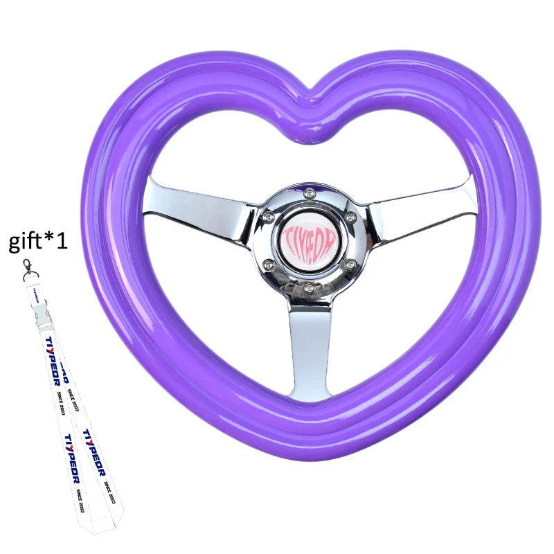 "Deep-pink heart emblem on 320mm ABS steering wheel with matching cover."
