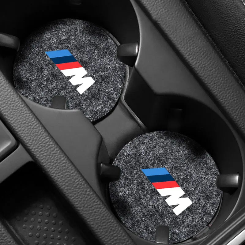 "Non-slip felt BMW E36 E46 cup holders. Protect your vehicle's steering wheel with these coasters featuring a sleek, logo-fre