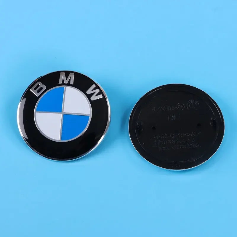 BMW Front or Rear Emblem Badge in two sizes: 74mm or 82mm. Authentic BMW accessory. (Size not specified: assume 1pc)
