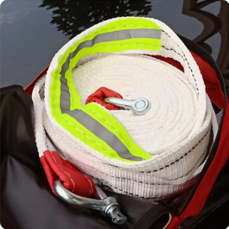 "Heavy-duty tow strap with hooks for emergency towing. Securely attach vehicles with confidence."