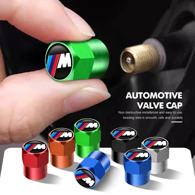 Set of four BMW car valve cap replacements.