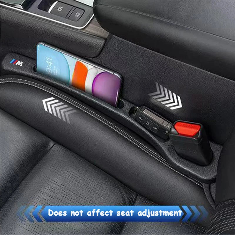 Two BMW seat gap fillers with integrated phone holders.