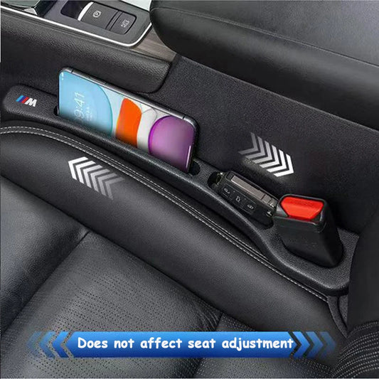 Two BMW seat gap fillers with integrated phone holders.
