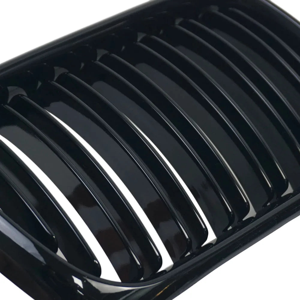 "Gloss Black Kidney Grille for BMW E36 (1997-1999) - Replacement part."