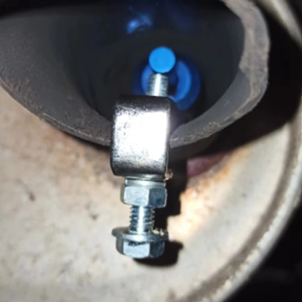 Close-up of a blue universal muffler insert for car exhausts.