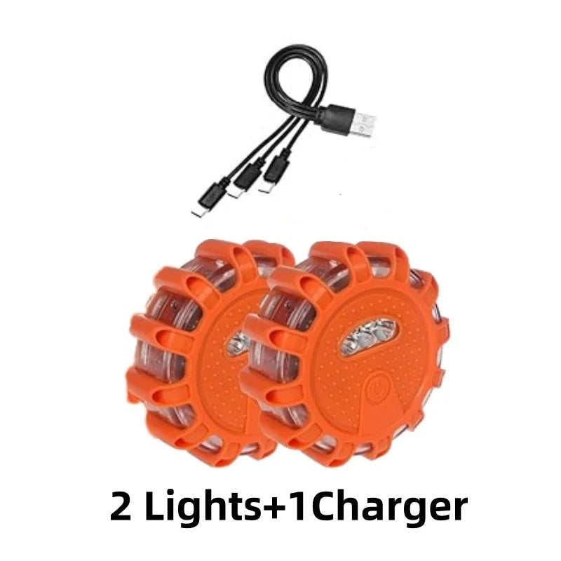 Two orange USB-rechargeable road flare LED lights with accompanying cables.