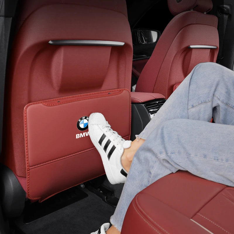 Back seat occupant protection: BMW E36 E46 seat back kick pad with storage bag.