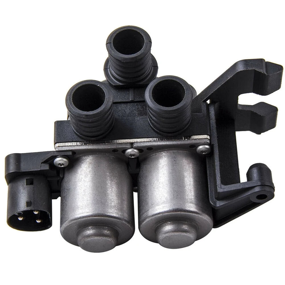 Black BMW E36 heater control valve fittings.

OR

Two black BMW E36 heater control valve fittings.