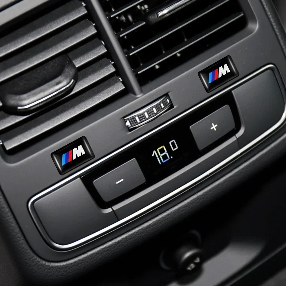 "Set of 5 BMW M Series emblem stickers for BMW E36, E46, E90, X5, and X6 vehicles. Epoxy material ensures durability."