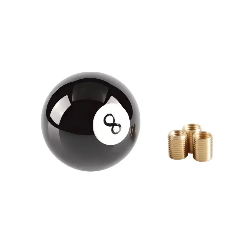 Black resin pool ball-style shift knob with universal adapter. Diameter: 60mm. Material: Resin with brass accents. Fits most 