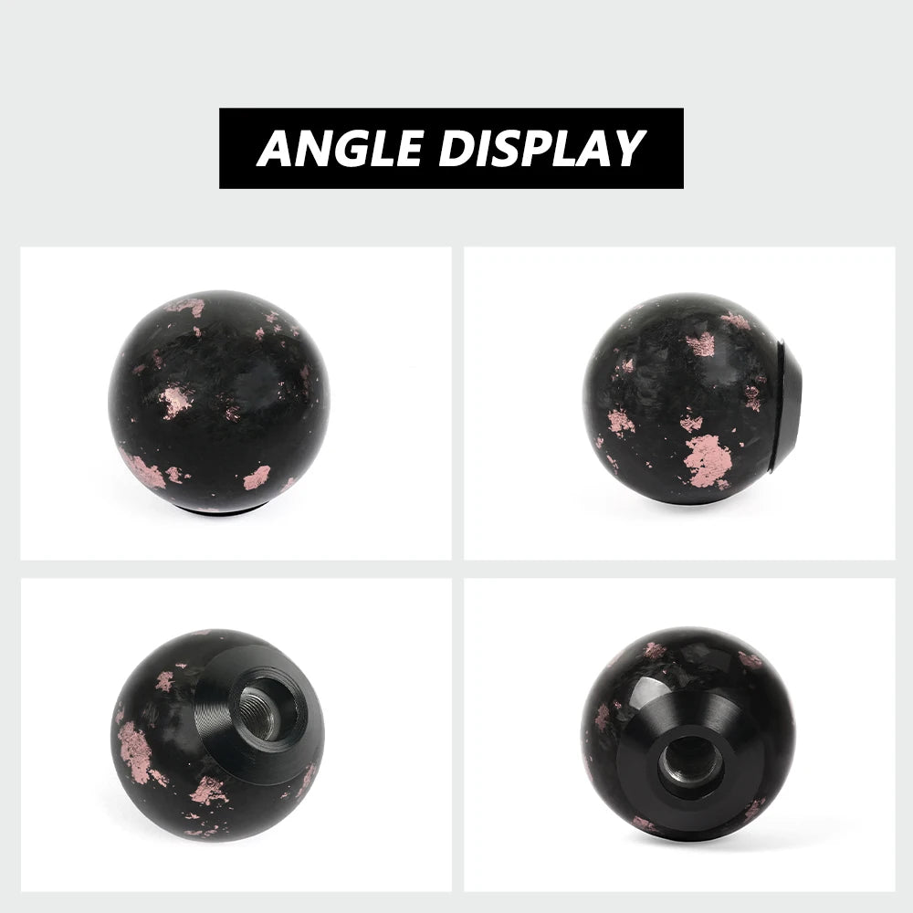 'Carbon fiber shift knob with black and pink marble detail. Suitable for manual and automatic transmissions.'
