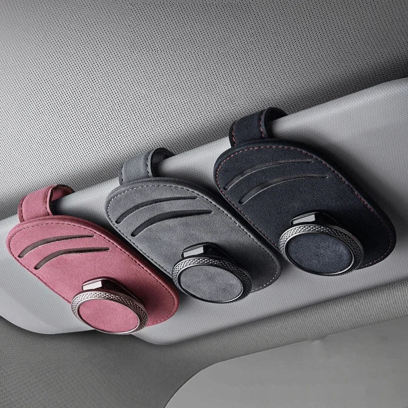 'PU leather zipper bag organizes car sun visors. Fits most sizes. Black.'