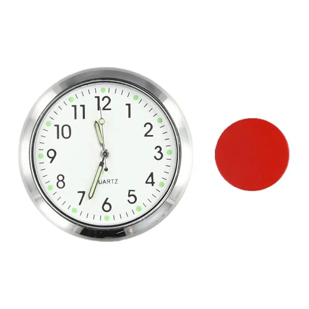 Red-accented car clock featuring a stationary ball indicator.