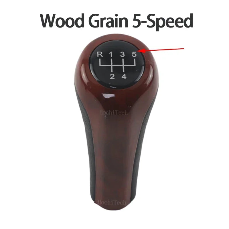 Red BMW shift knob with "5/6-Speed" inscription. Fits E30, E36, E46, E90, E60, X5, and Z4 models.