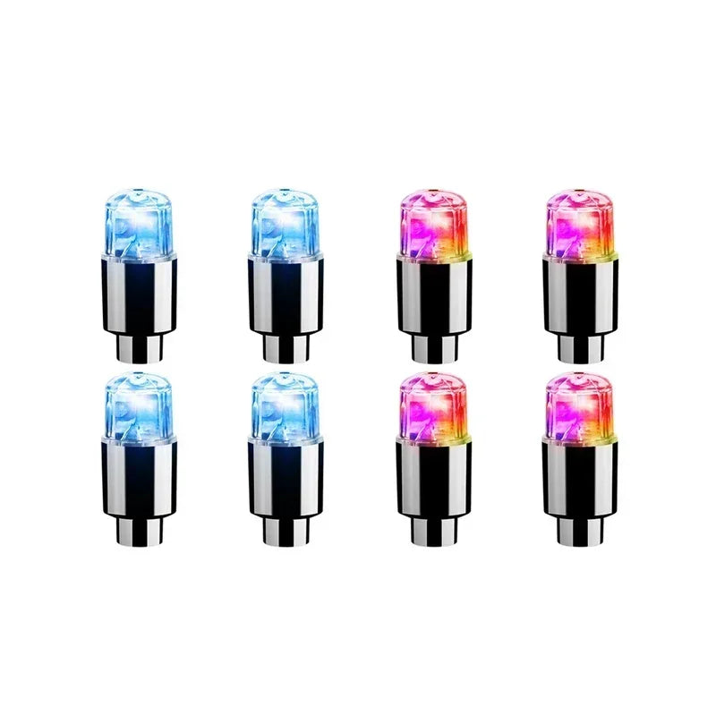 'Four RGB LED wheel lights in colorful kit — fits valve stems of car, bike, or motorcycle. 4pcs per lot.'