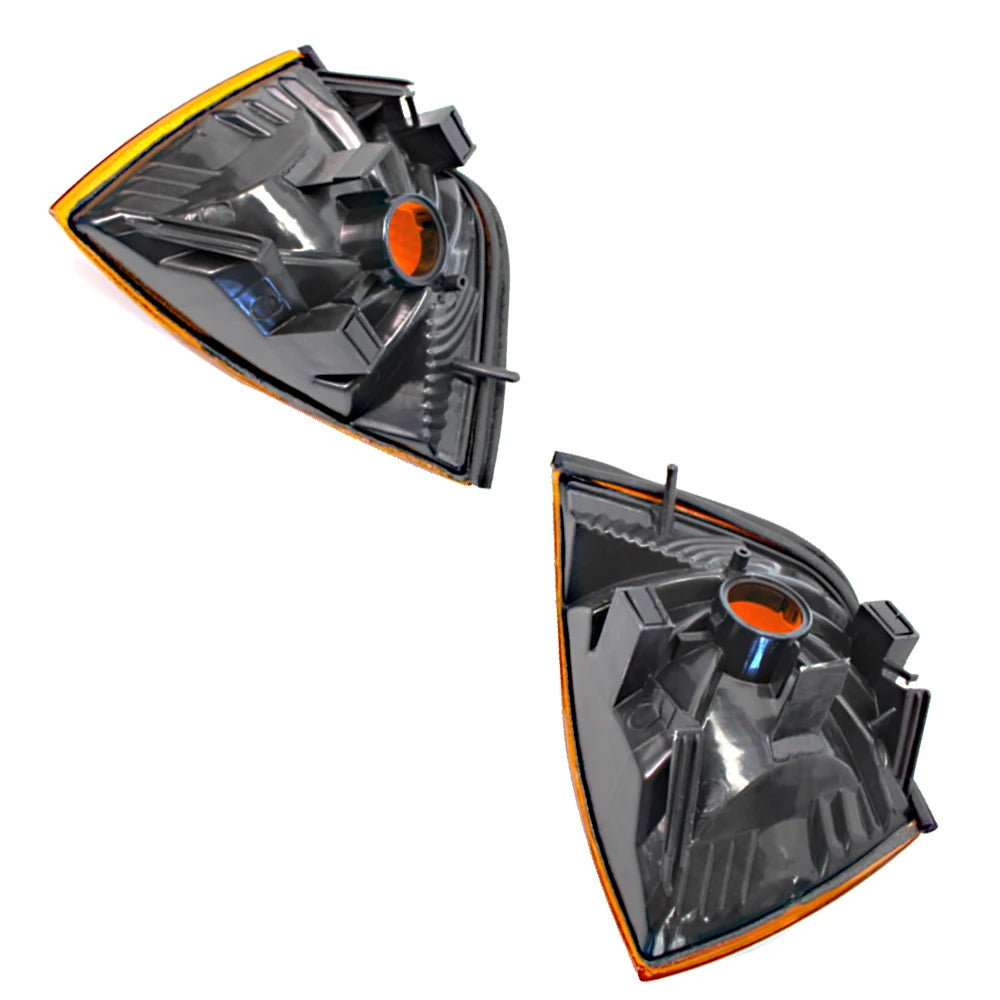 "BMW E36 4-door car: Pair of black and orange LED-ready corner lights."