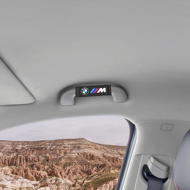 "BMW M-Style Roof Handle Grip Cover with interior pull strap."