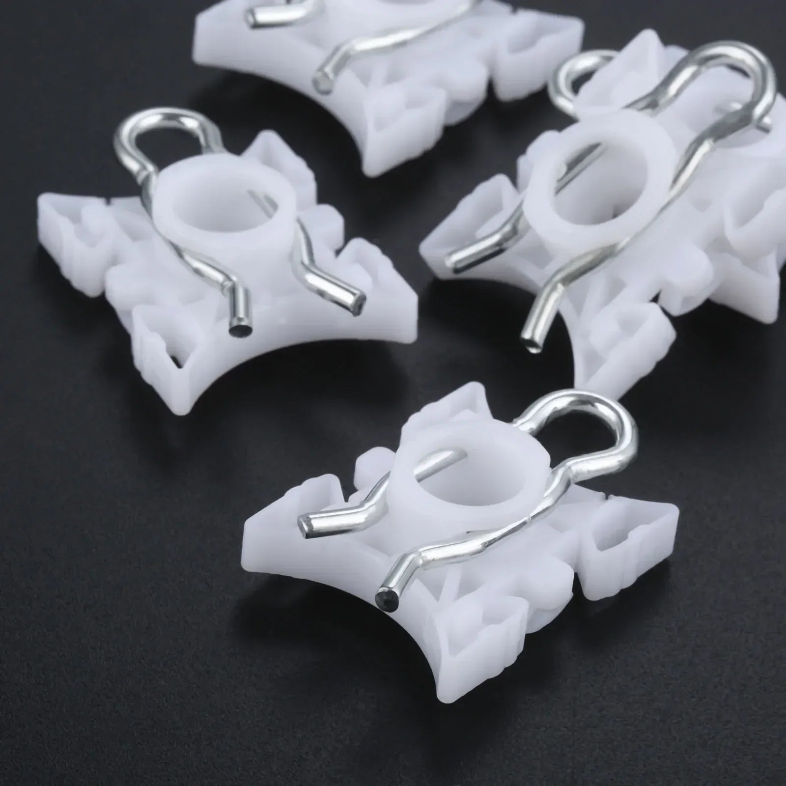 Ten white pivot clips for BMW E36 window regulators. Replacement parts set.