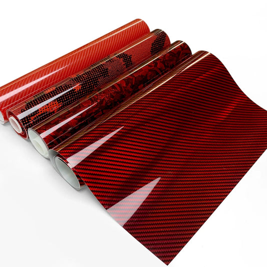 'Red vinyl car/bike decal emulating carbon fiber. Measures XXcm x YYcm.'