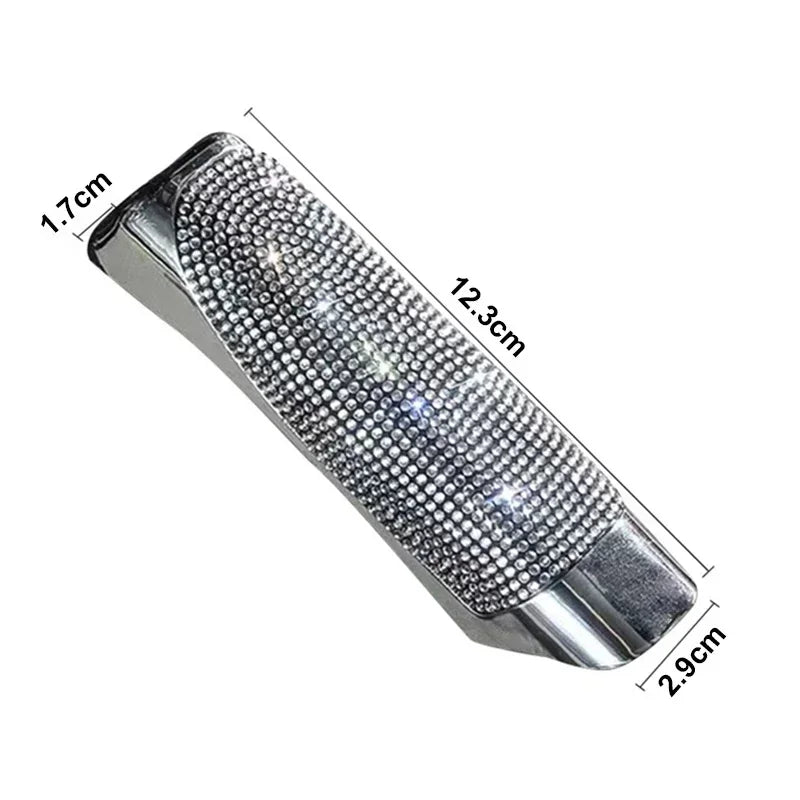 "Universal fit Diamond handbrake cover in silver and black design."

Or for a more descriptive version:
"Universal fit handbr