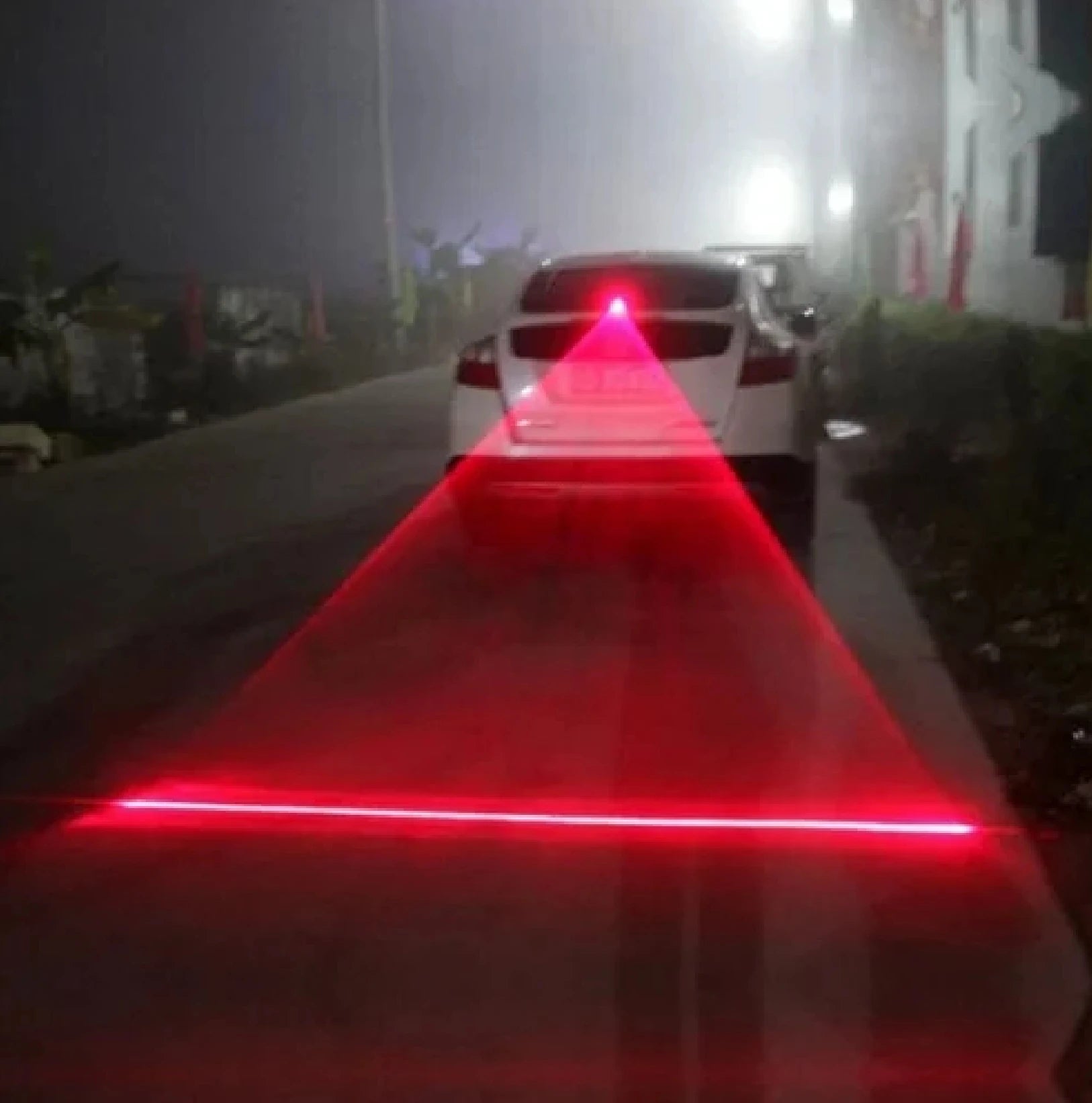'Car with red LED laser lights, anti-fog/collision. Universal fit.'
