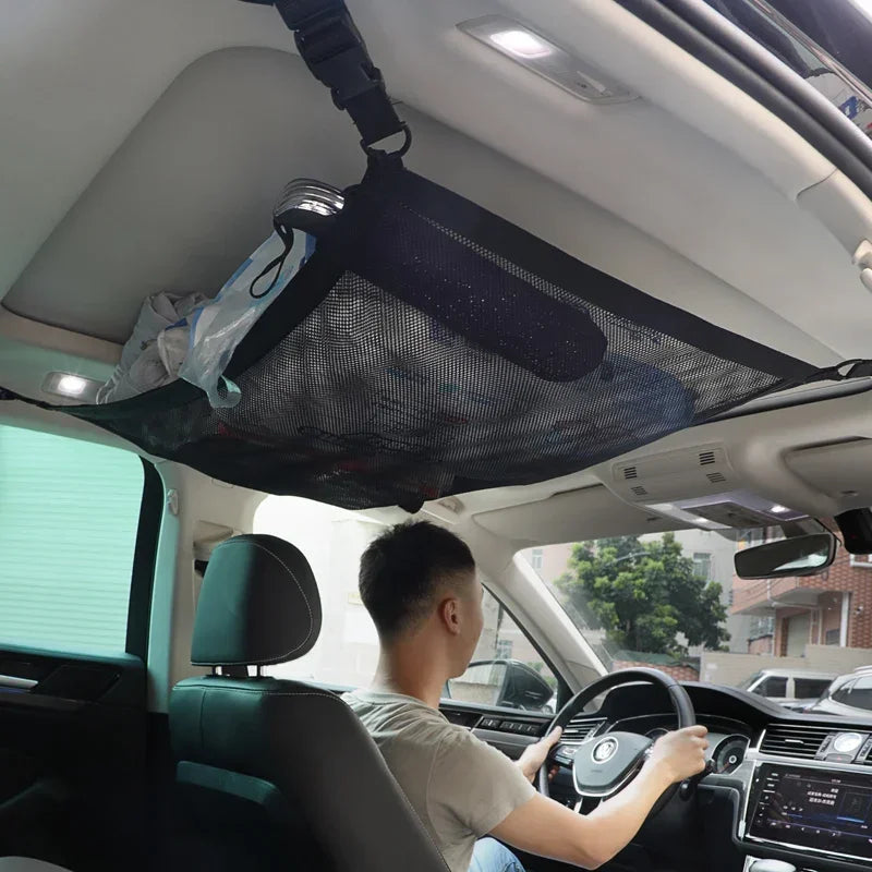 'SUV roof storage net with pockets - organizes gear, fits most sunroofs.'