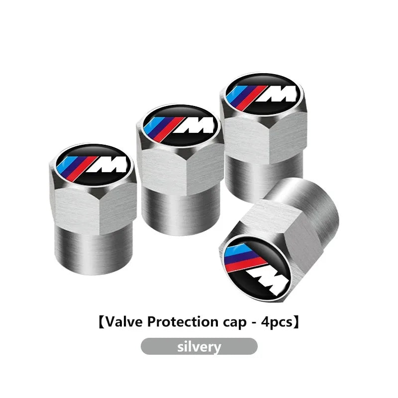 "Four piece set of BMW car wheel center caps, compatible with models E30, E36, and E36."