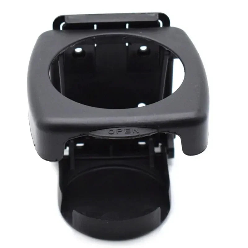 Black plastic phone mount with folding design, suitable for car cup holders or ashtray use. Compatible with beverage cups and