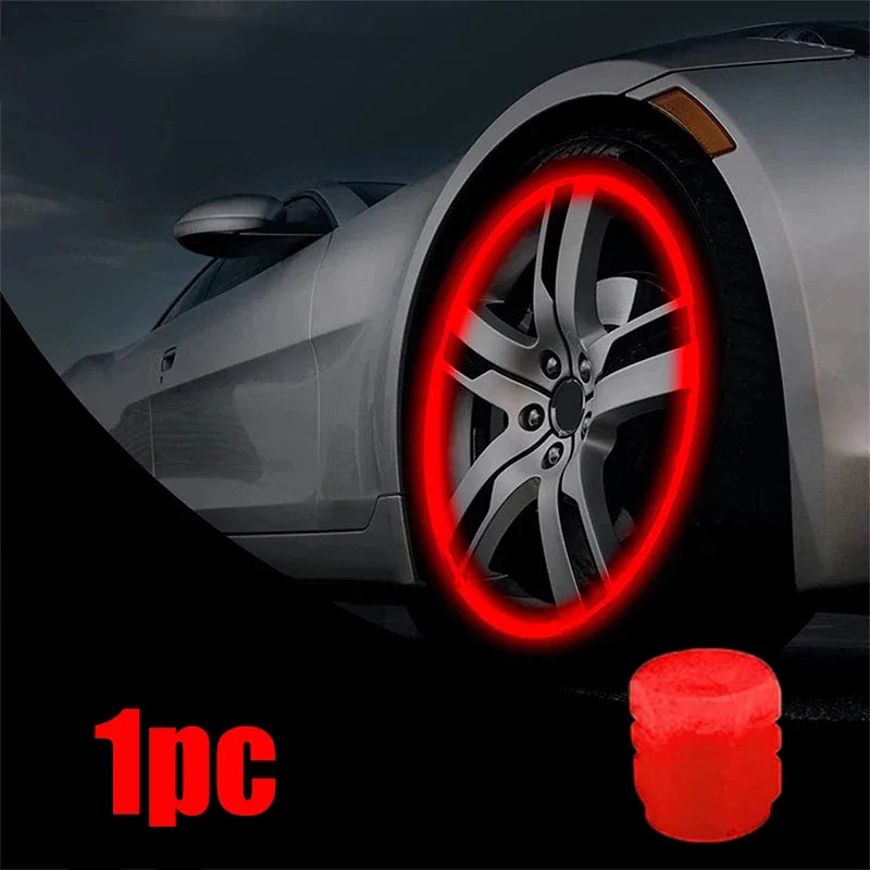 Red-accented vehicle with glowing valve caps — Luminous tire accessories add style to night drives.