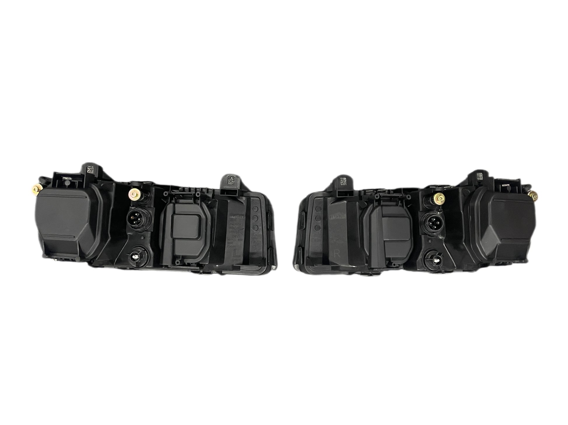 Two black housing units for BMW E36 Euro Projector Headlights.