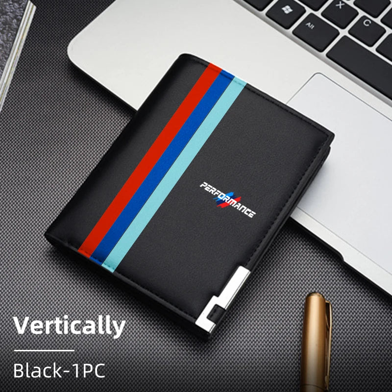 "Black and blue leather BMW car wallet with card holder. Not included: laptop."