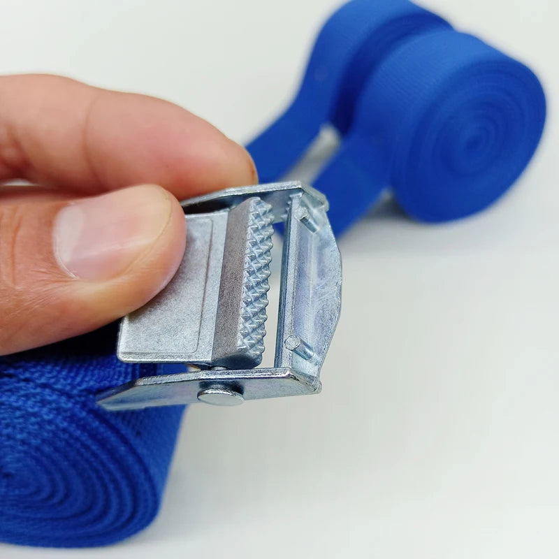 Person holding a blue cargo strap with metal buckle.

(Note: The above alt text is a suggestion based on the given product ti