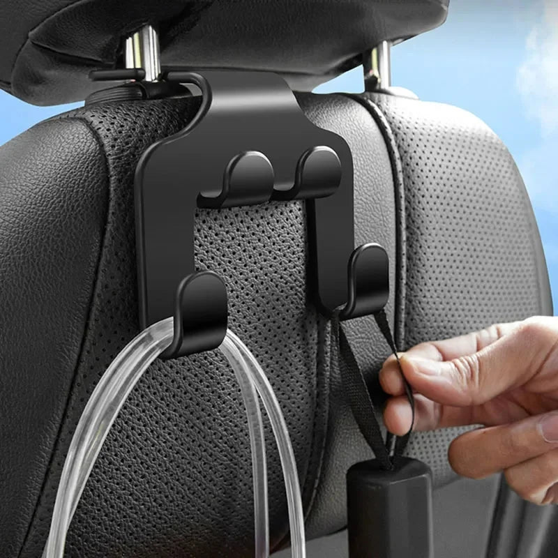 Car seat headrest hook organizer in black. Universal clip holder for storage accessories. Fits most vehicle models.