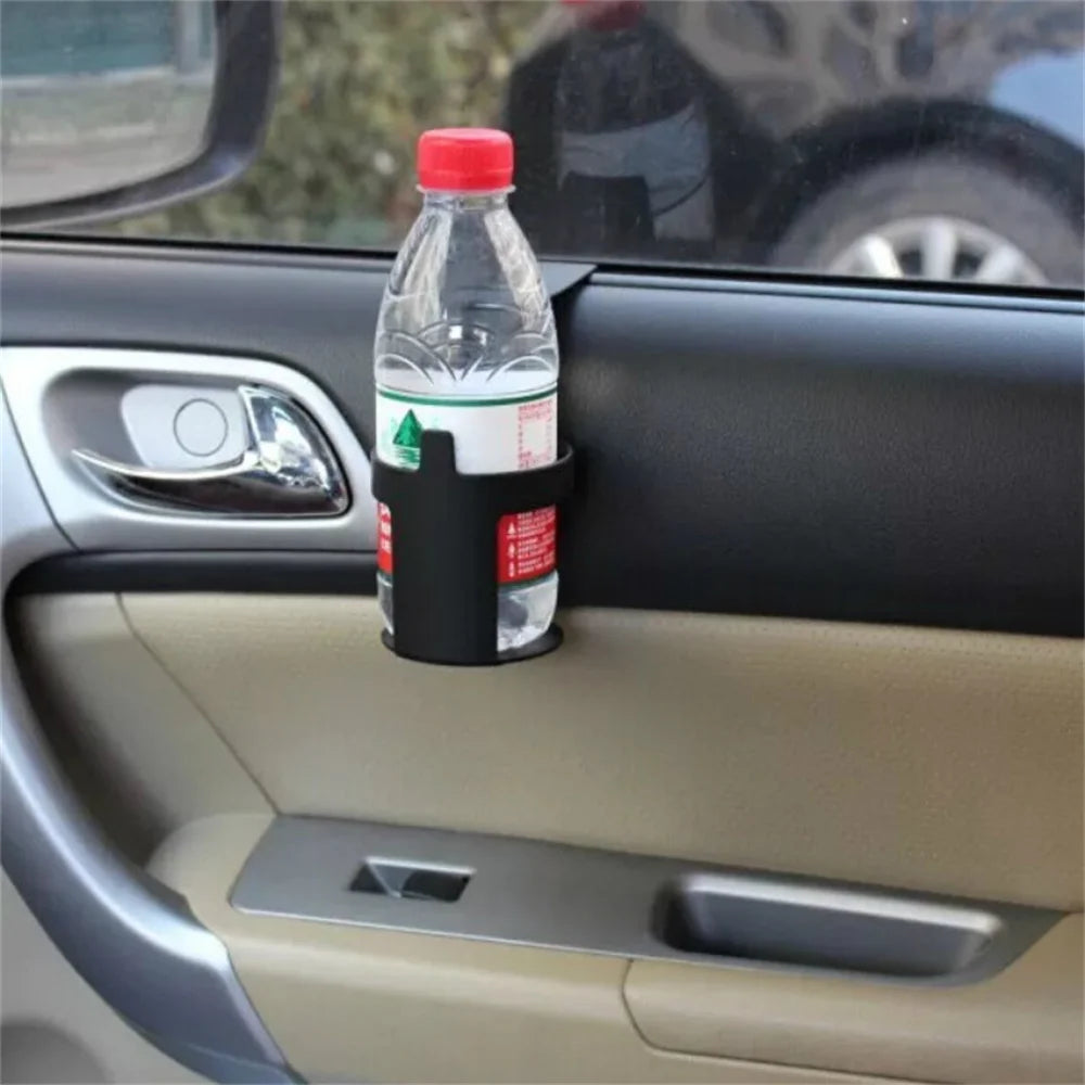 Car window cup holder with water bottle on dashboard. Portable beverage organizer for driving convenience. Fits cups, cans, a