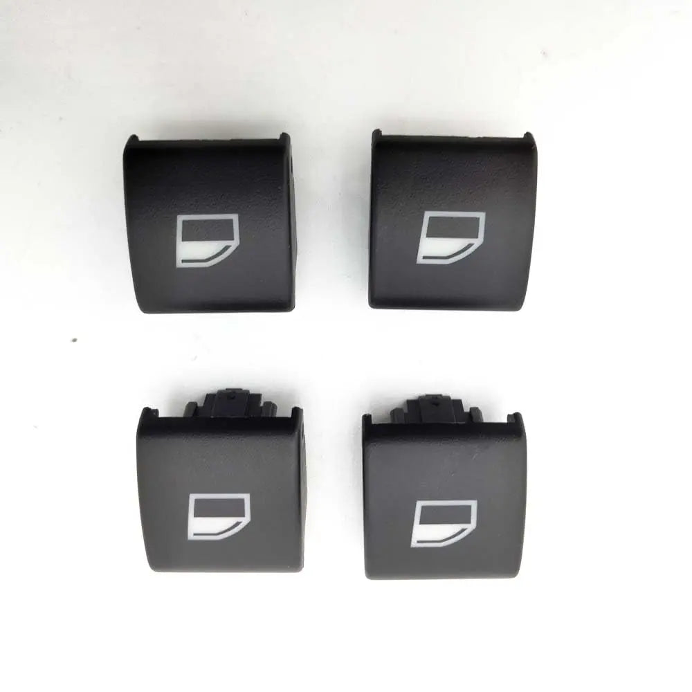 Four window switch button caps for BMW E46 models (323i, 325i, 330i, M3). Replace worn or damaged parts. Set of 4.