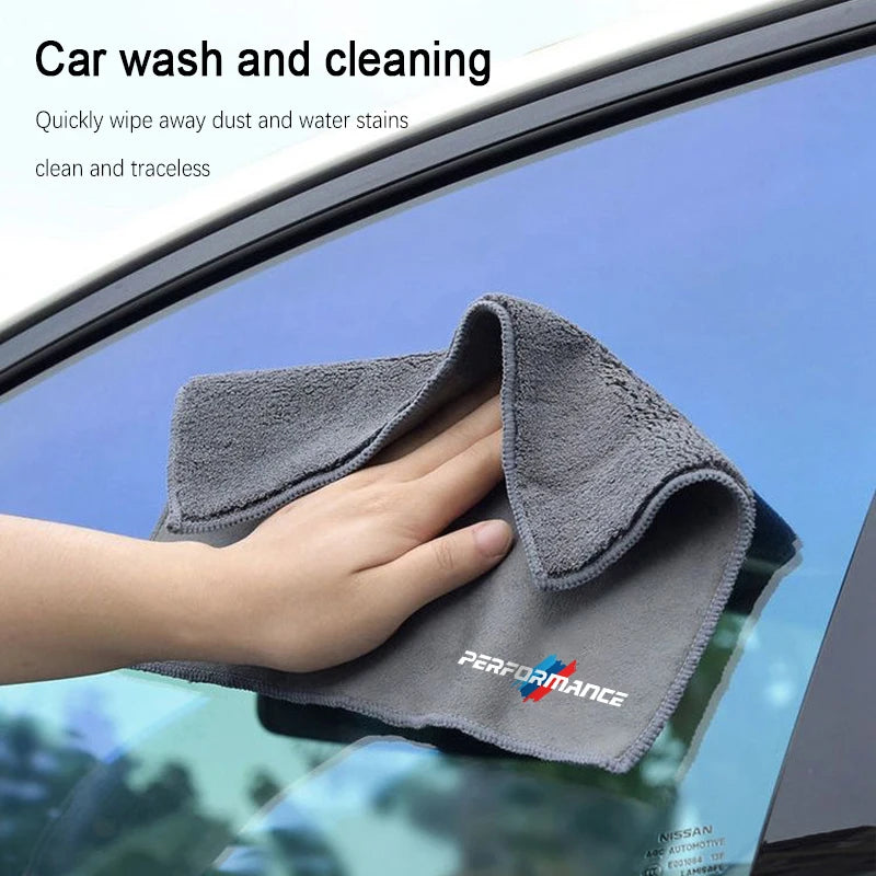 "White, absorbent microfiber car washing cloth with smooth texture and excellent water holding capacity for thorough and gentle automobile surface cleaning."